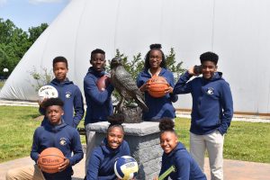 Holy Trinity Athletics, students in front of the Reiber Center