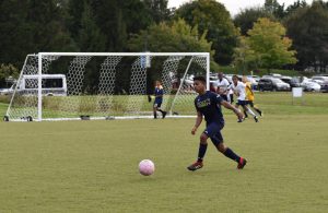 Holy Trinity soccer action on the field