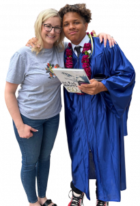 HS Prep student and teacher at graduation