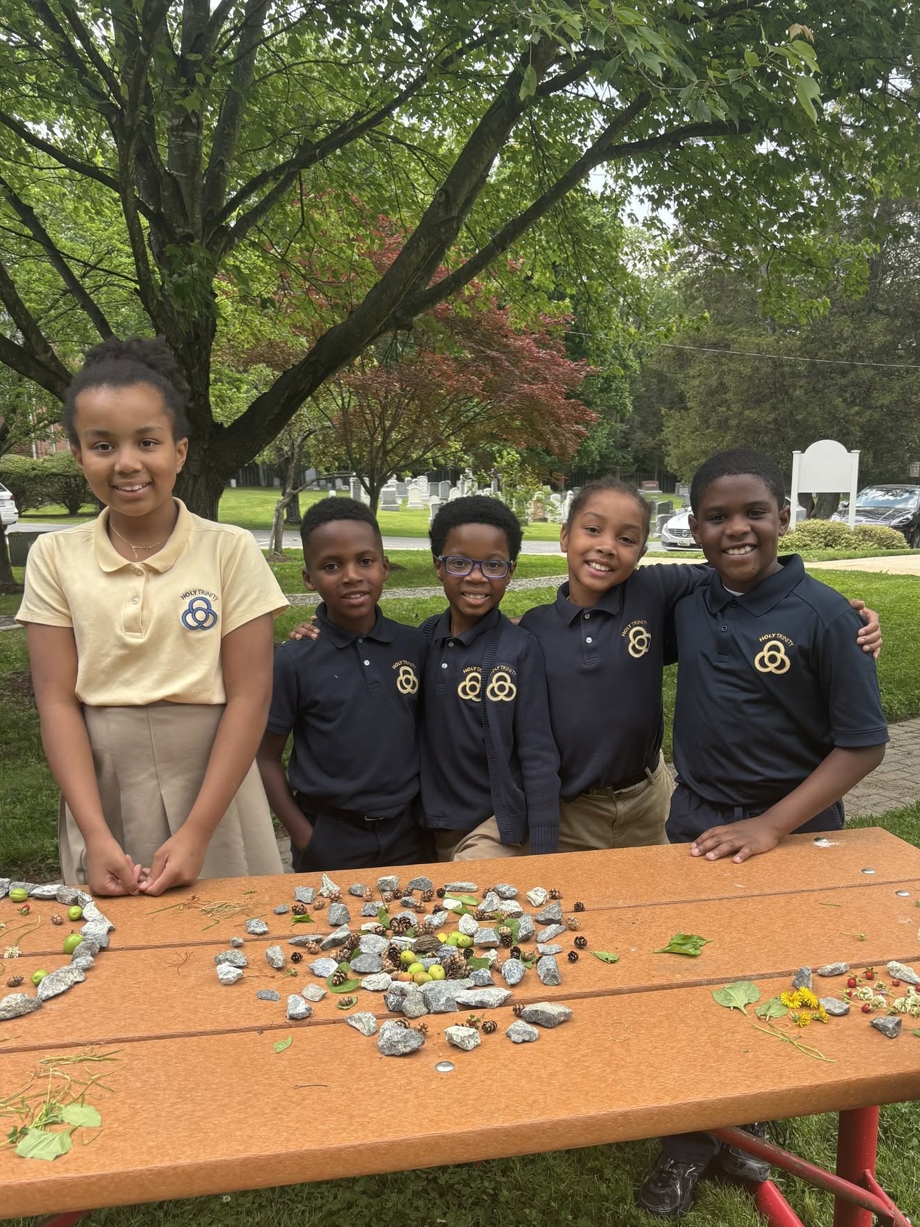 Third-graders work on outdoor project.
